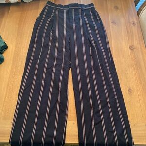 Urban outfitters women’s M black pants with burgundy stripes.